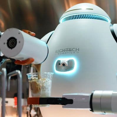 adam the robot makes a coffee