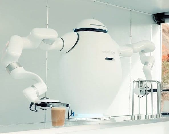 adam robot in a white trailer