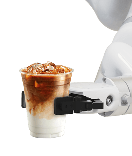 robot arm holds a coffee